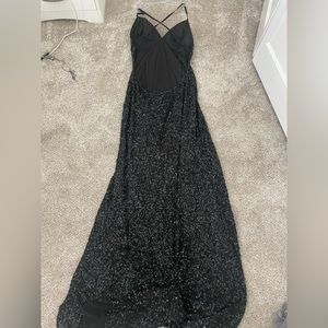 black sparkling open back formal dress